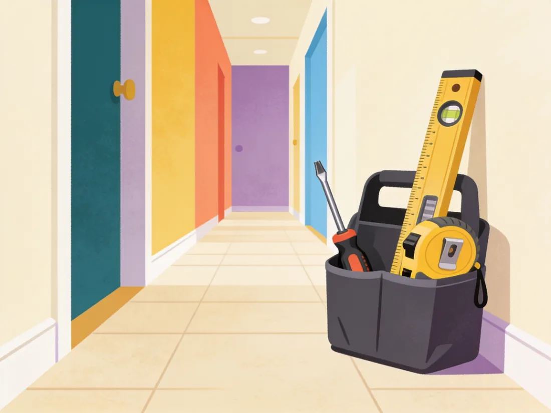 A tool caddy with a screwdriver, tape measure, and level ready to use.